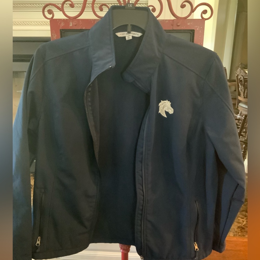 Navy, fleece lined jacket.